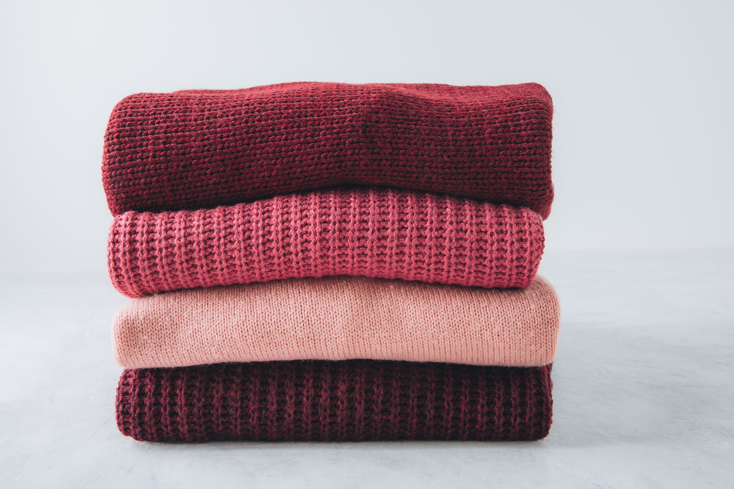 Folded Laundry Red Shutterstock 2392434327